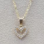 Dije silueta corazón diamantes